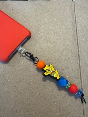 Care Bears Yellow Rainbow Bear Phone Charm with Red, Orange & Blue Beads